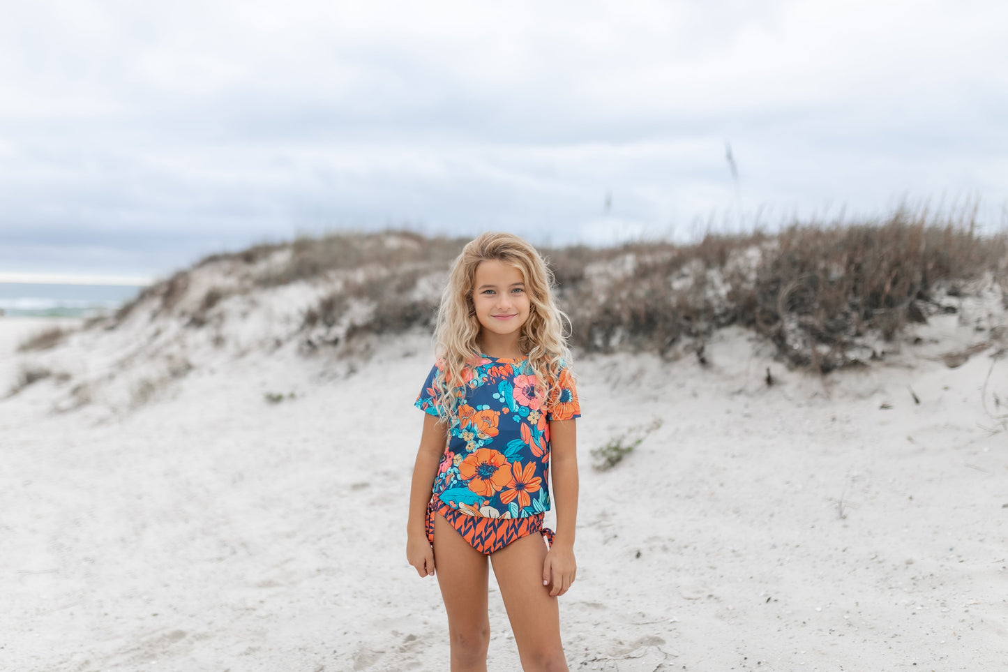 NAVY ORANGE RASH GUARD SWIMSUIT