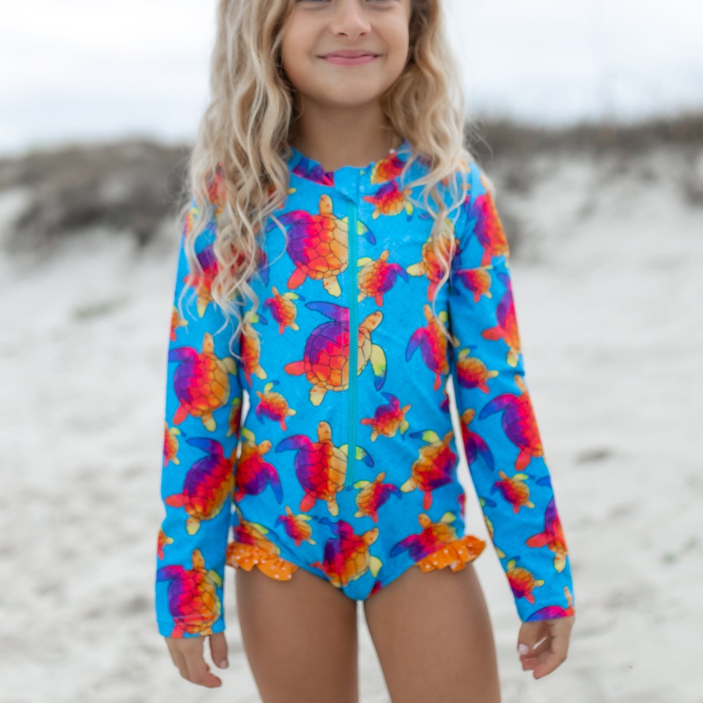 BLUE RAINBOW TURTLE ZIP SWIMSUIT